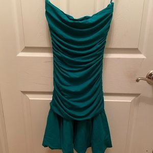 Strapless beautiful green cascading dress.